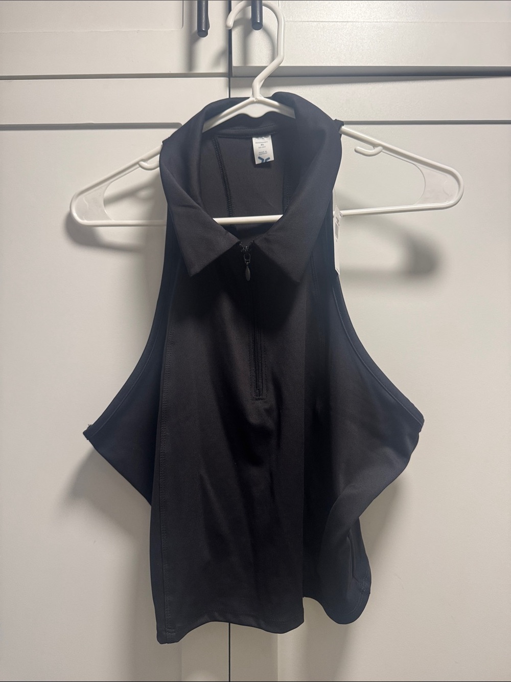 Black Sleeveless Zip Polo Top